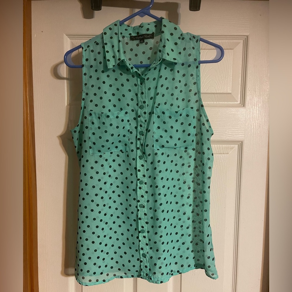 Sleeveless button up blouse. See thru mint with black dots